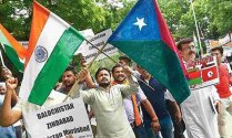 Baloch Terrorist waving Indian flag.jpg