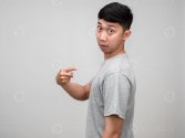 asian-man-grey-shirt-turn-around-and-point-finger-at-himself-about-choose-me-isolated-photo.jpg