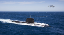 AUS MH-60R Seahawk helicopter conducts an anti-submarine exercise with HMAS Rankin in Jervis Bay.png