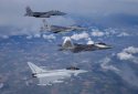 RAF Typhoons of 3(Fighter) Sqn working closely with USAF Eagles and Raptors.jpg