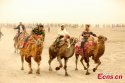 Dawakun-Desert,Yuepuhu-county,Xinjiang.(1).riding-camels.jpg