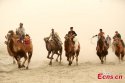 Dawakun-Desert,Yuepuhu-county,Xinjiang.(2).riding-camels.jpg