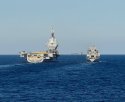 French aircraft carrier Charles de Gaulle conducts a replenishment at sea with the Fr ship Marne.jpg