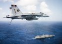 F-A-18E Super Hornet from VFA 113 flies over USS Theodore Roosevelt in the Western Pacific .jpg