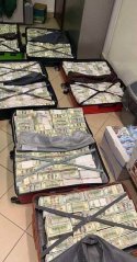 Six suitcases stuffed full of cash - US$ 28 million dollars and 1.3 million euros (March 2022)...jpg